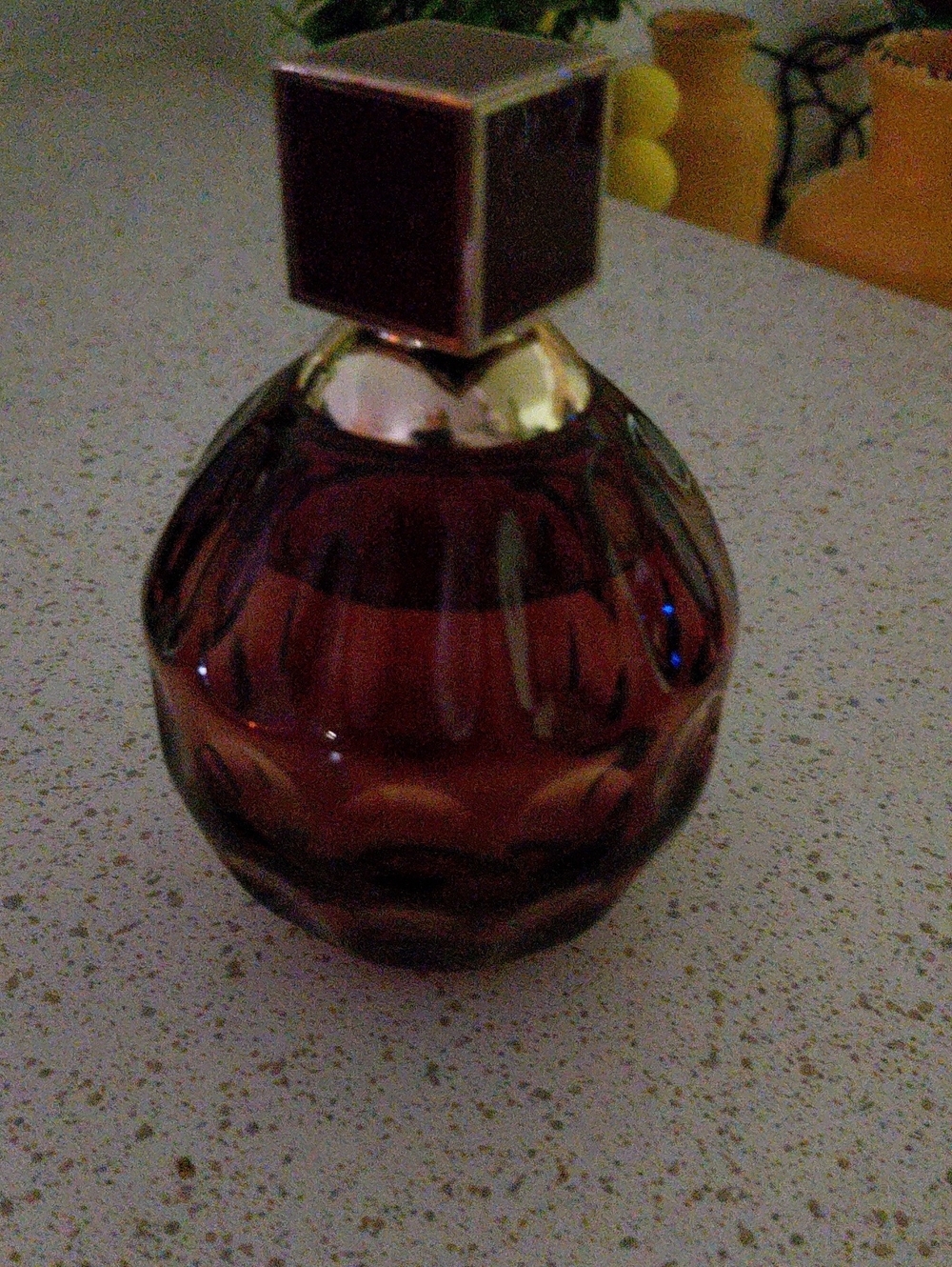 Faceted Amber Glass Decorative Bottle with Gold Collar